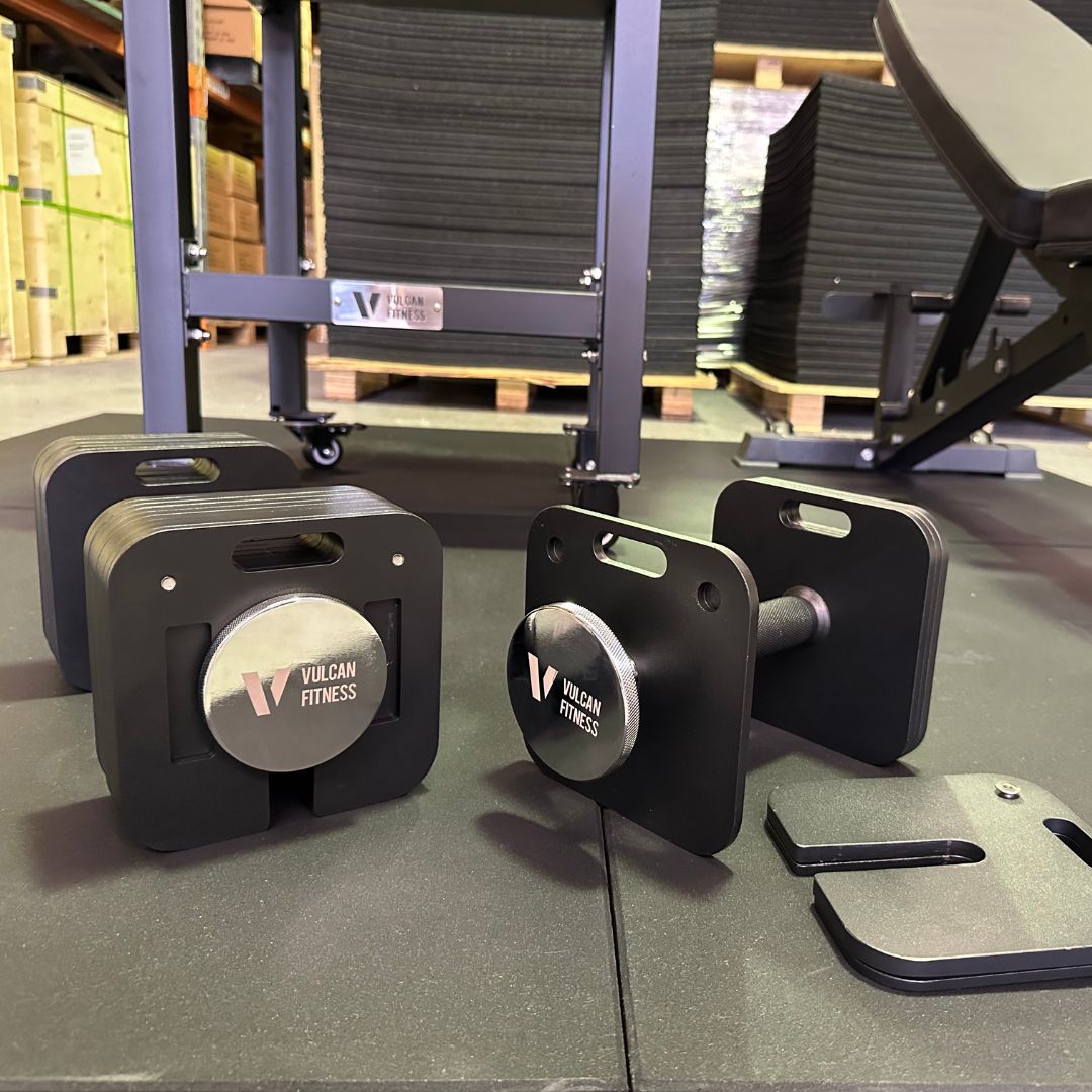VULCAN adjustable dumbbells with removable plates and a twist-lock end screw